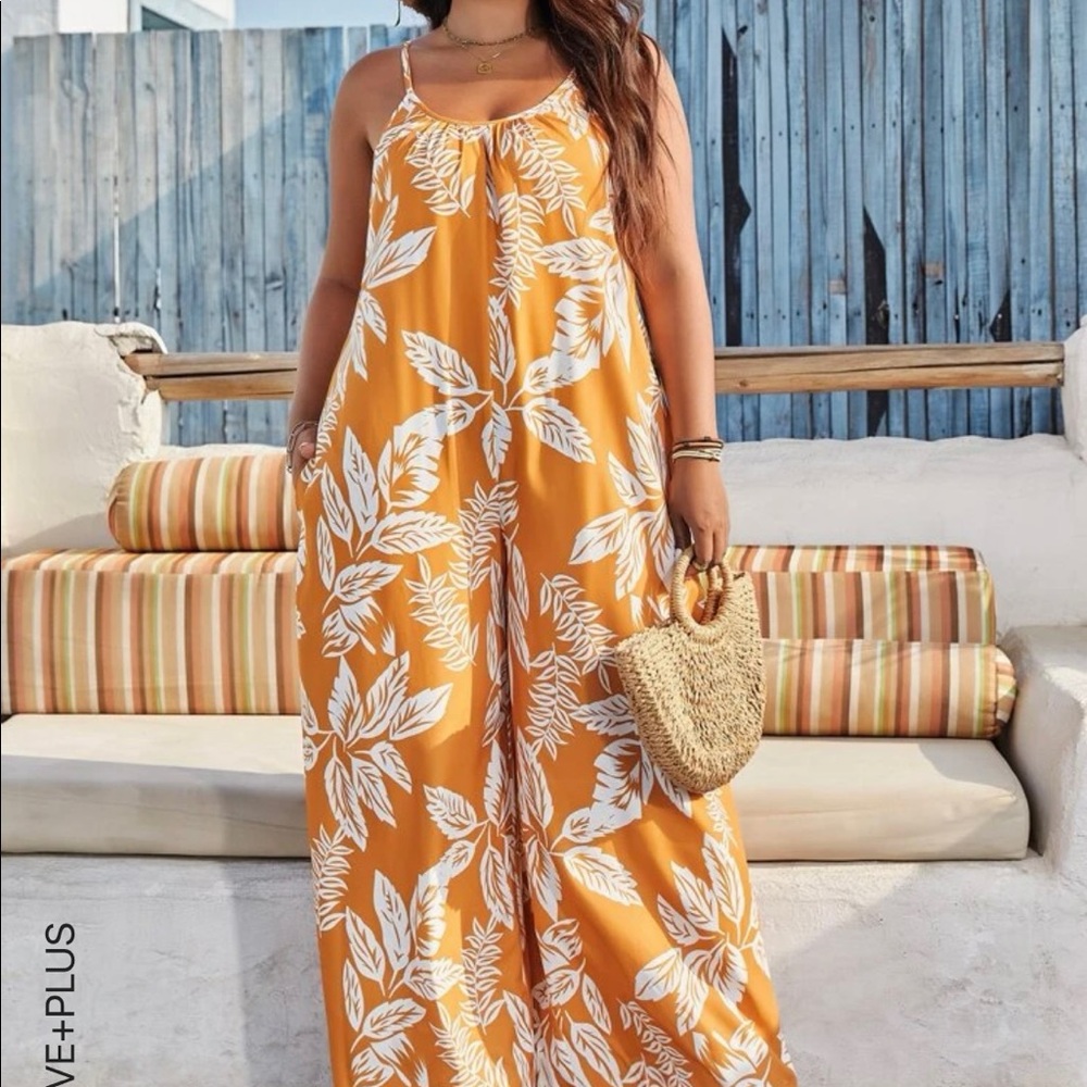 Yellow floral jumpsuit, size 4X, new without tags.